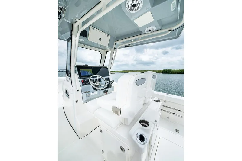  Yacht Photos Pics Manufacturer Provided Image: 2025 Pursuit S 268 Sport boat interior with modern helm and seating.