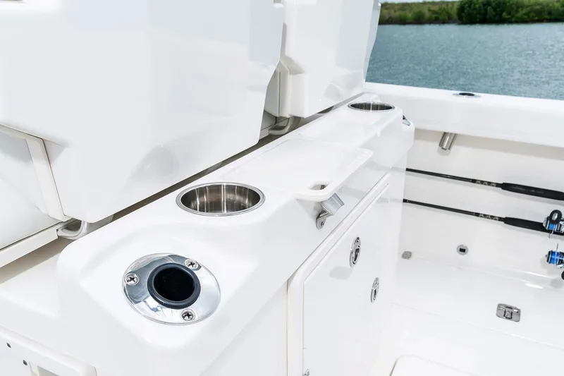  Yacht Photos Pics Manufacturer Provided Image: 2025 Pursuit S 268 Sport boat interior with rod holders and storage compartments.