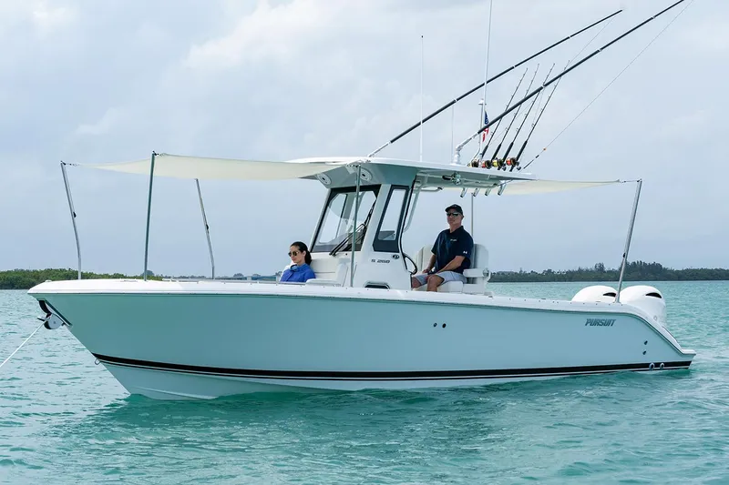  Yacht Photos Pics Manufacturer Provided Image: 2025 Pursuit S 268 Sport boat on calm turquoise water, equipped for fishing.