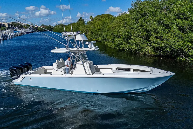  Yacht Photos Pics 2018 SeaVee 370z boat cruising on a scenic waterway.