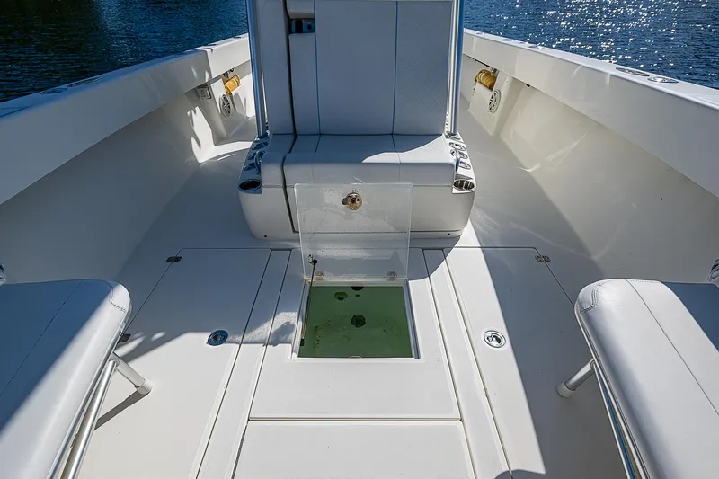  Yacht Photos Pics 2018 SeaVee 370z boat interior with seating and storage compartments.