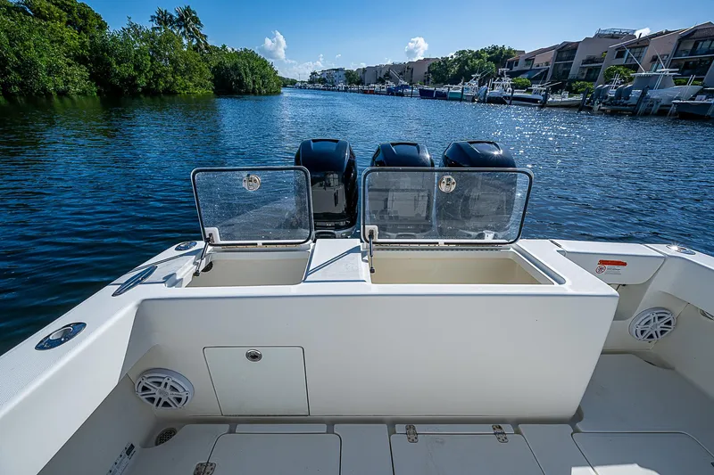  Yacht Photos Pics 2018 SeaVee 370z boat with triple engines on a scenic waterway.