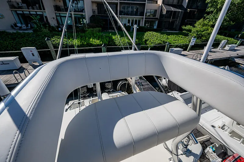  Yacht Photos Pics 2018 SeaVee 370z boat helm seat with marina background.