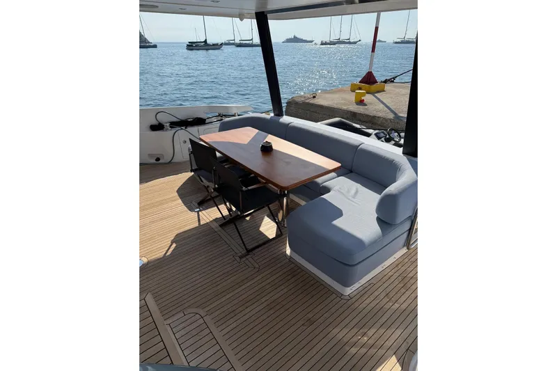  Yacht Photos Pics Azimut 68 FLY 2022 yacht deck with seating and ocean view.