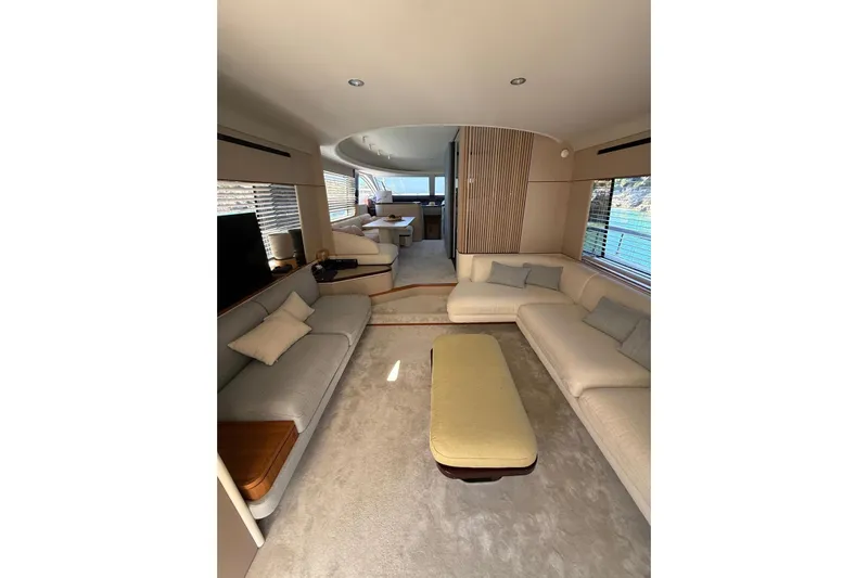  Yacht Photos Pics Luxurious interior of 2022 Azimut 68 FLY yacht with elegant seating and modern design.