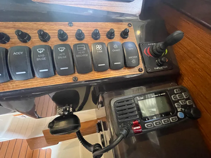 Beautiful Boat At Great Price! Yacht Photos Pics Control panel of 2023 Ranger Tugs R-25 with switches and communication device.