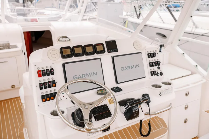  Yacht Photos Pics Cockpit of 2010 Everglades 350LX boat with Garmin navigation system and control panel.