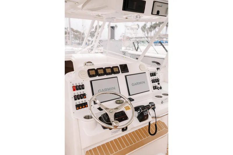  Yacht Photos Pics Cockpit of 2010 Everglades 350LX boat with Garmin navigation system and controls.