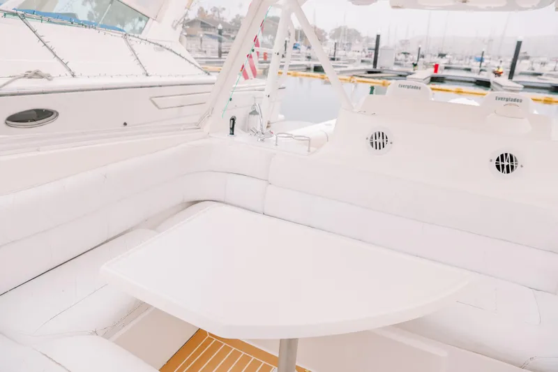 Yacht Photos Pics Luxurious seating area on a 2010 Everglades 350LX boat at a marina.