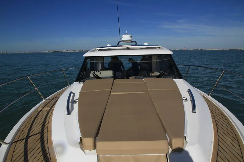  Yacht Photos Pics 2025 Skamander Monaco Coupe yacht on open water, featuring sleek design and spacious deck.