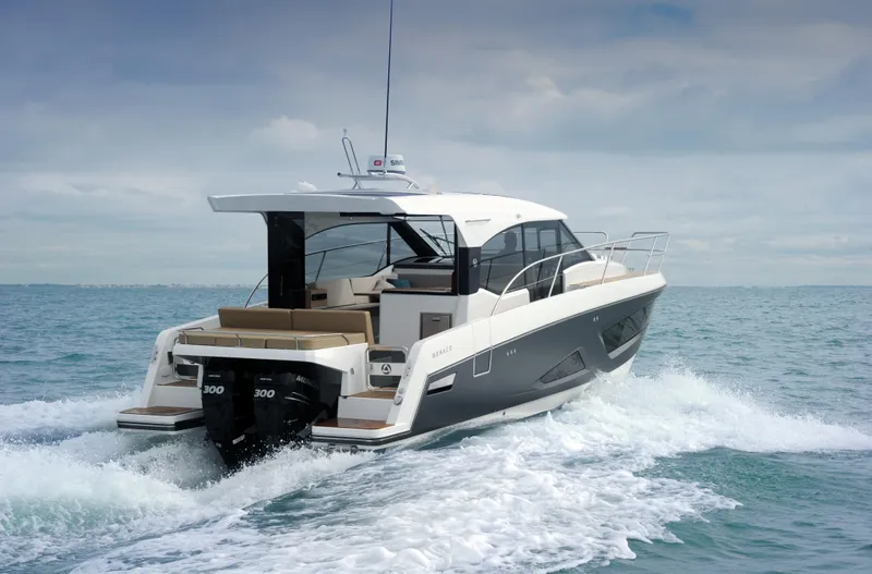  Yacht Photos Pics 2025 Skamander Monaco Coupe yacht cruising on open water.