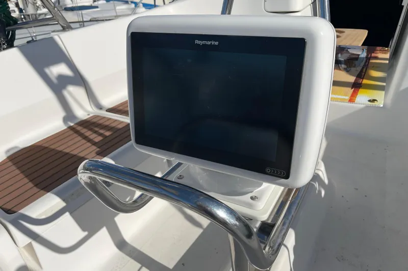  Yacht Photos Pics Raymarine navigation display on 2008 Hunter 49 yacht, featuring sleek design and modern technology.