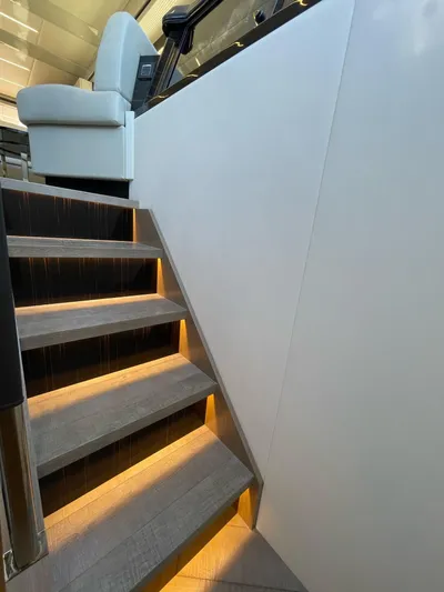  Yacht Photos Pics Staircase with ambient lighting on 2019 Absolute 62 Fly yacht.