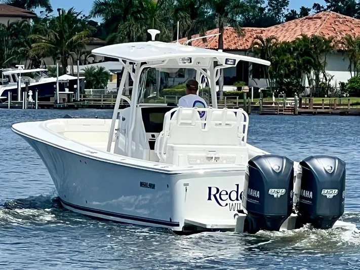Redemption Yacht Photos Pics 2012 Regulator 34SS boat with twin Yamaha engines cruising on a sunny day.