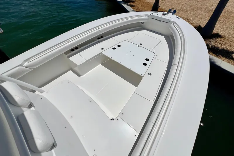 Redemption Yacht Photos Pics 2012 Regulator 34SS boat deck with spacious seating and storage compartments.