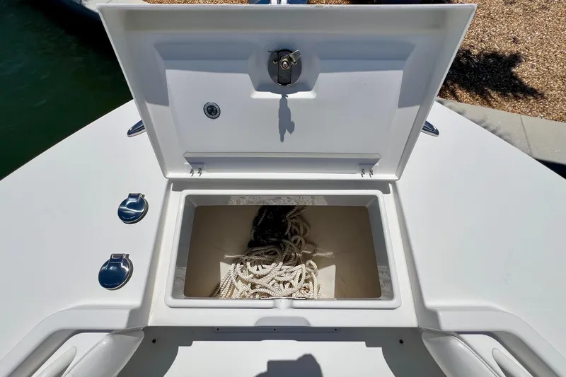 Redemption Yacht Photos Pics Open storage compartment on 2012 Regulator 34SS boat, containing coiled rope.