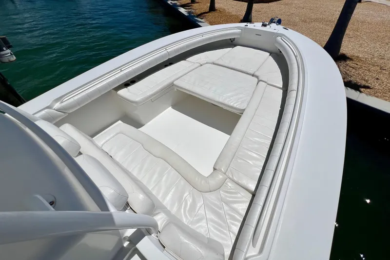 Redemption Yacht Photos Pics 2012 Regulator 34SS boat with spacious white seating area and sleek design.