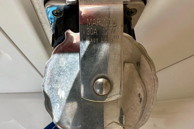 Redemption Yacht Photos Pics Close-up of a Marinco 30A 125V Easy Lock outlet on a 2012 Regulator 34SS boat.