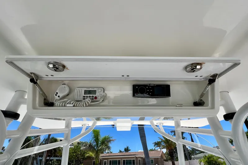 Redemption Yacht Photos Pics 2012 Regulator 34SS boat console with radio and communication equipment.