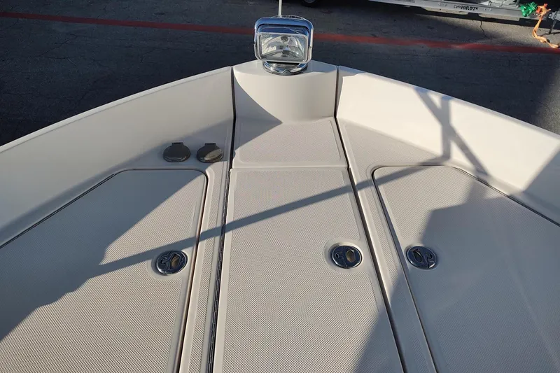 Me Yacht Photos Pics Bow of 2021 Regal 42 Fly yacht with sleek deck design and fixtures.