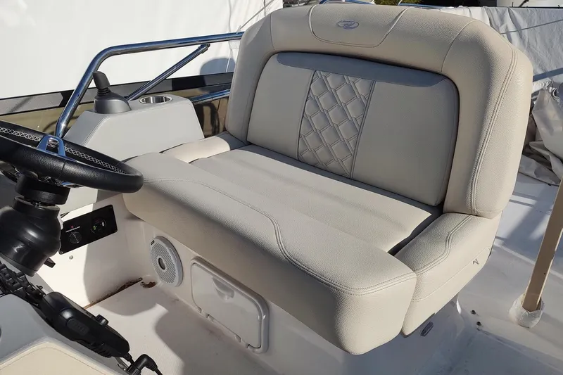 Me Yacht Photos Pics Luxurious seating on 2021 Regal 42 Fly yacht with elegant design and steering wheel.