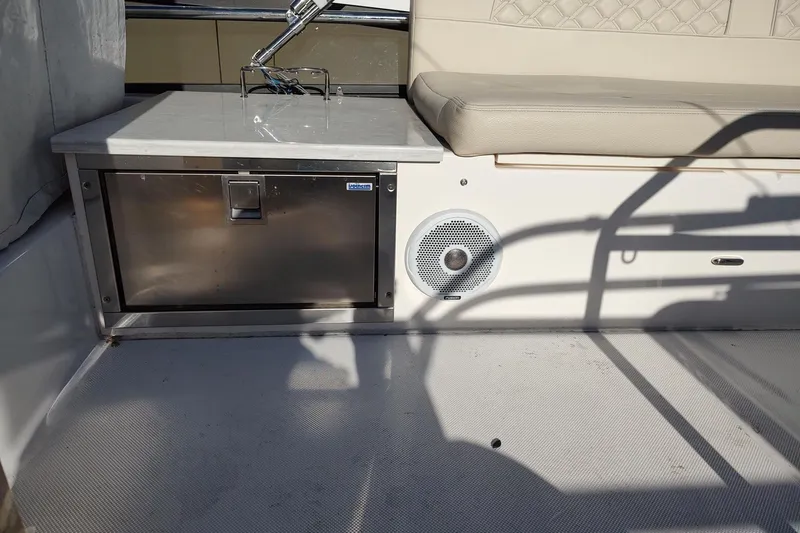 Me Yacht Photos Pics Interior of 2021 Regal 42 Fly yacht with seating and storage.