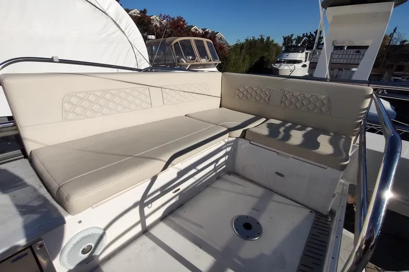 Me Yacht Photos Pics Luxurious seating area on a 2021 Regal 42 Fly yacht, featuring elegant beige upholstery.