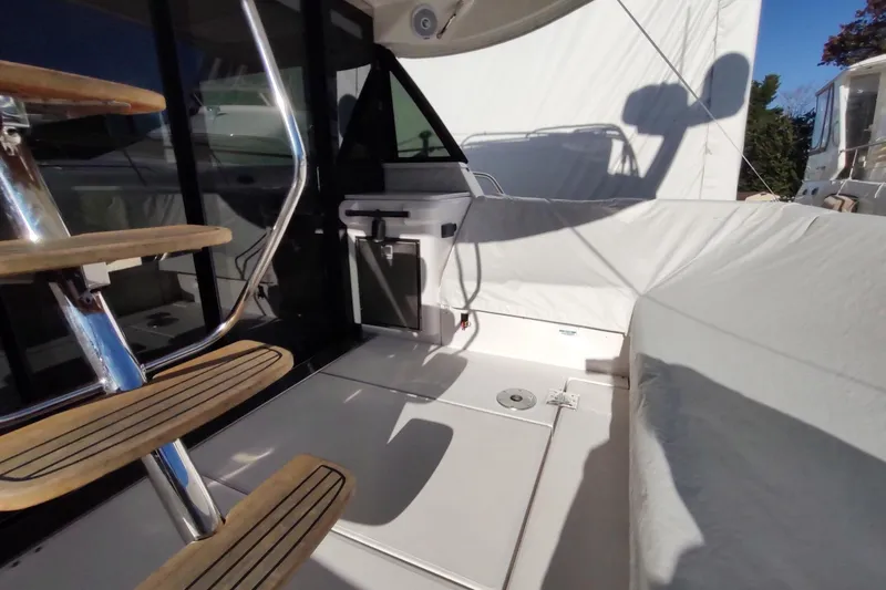 Me Yacht Photos Pics 2021 Regal 42 Fly yacht interior with sleek stairs and modern design.