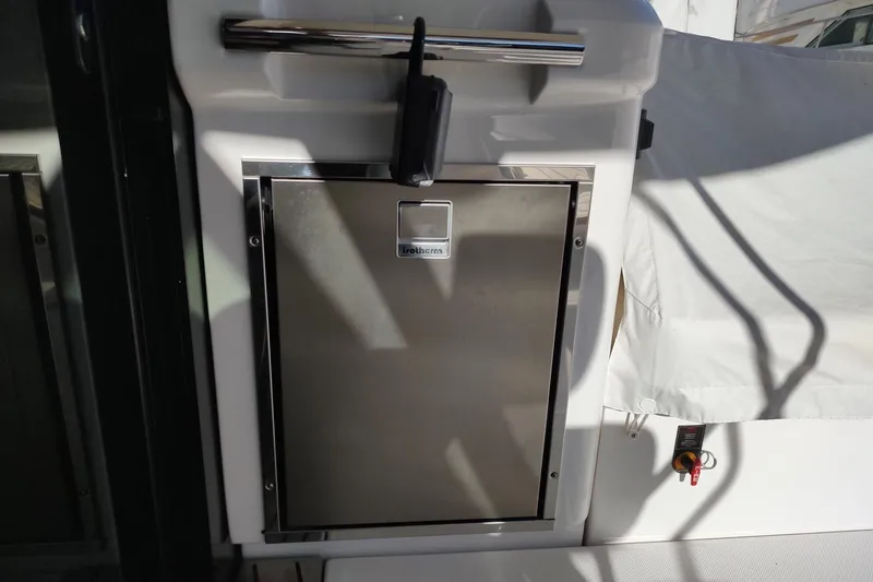 Me Yacht Photos Pics Stainless steel refrigerator on 2021 Regal 42 Fly yacht deck.