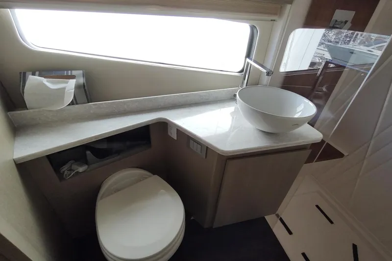 Me Yacht Photos Pics Luxurious bathroom in 2021 Regal 42 Fly yacht with modern fixtures and elegant design.