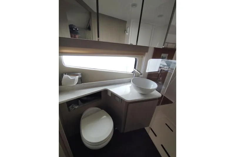 Me Yacht Photos Pics Luxurious bathroom interior of 2021 Regal 42 Fly yacht with modern fixtures.