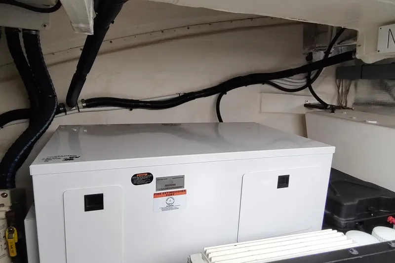 Me Yacht Photos Pics Engine room of 2021 Regal 42 Fly yacht with generator and wiring.