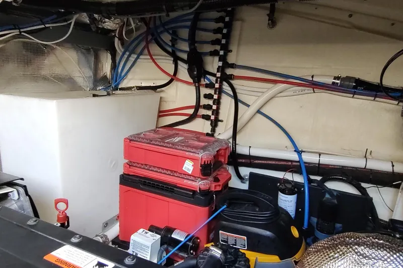 Me Yacht Photos Pics Engine room of 2021 Regal 42 Fly yacht with wiring and equipment.