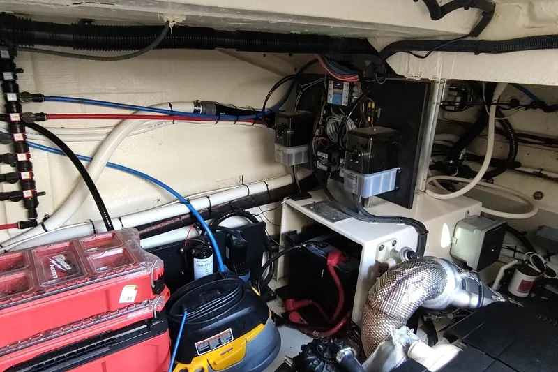 Me Yacht Photos Pics Engine room of 2021 Regal 42 Fly yacht with wiring and equipment.