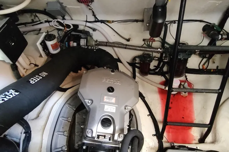 Me Yacht Photos Pics Engine room of 2021 Regal 42 Fly yacht, showcasing mechanical components and systems.