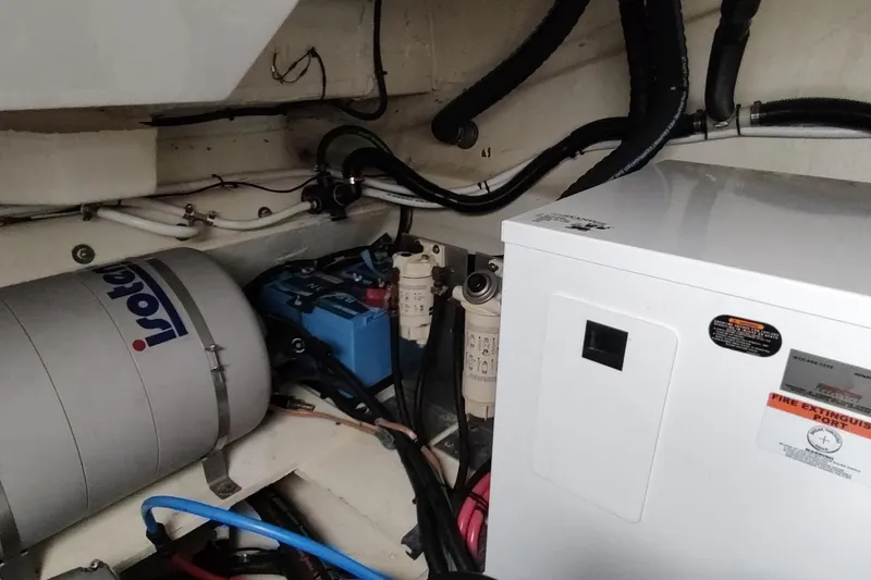 Me Yacht Photos Pics Engine room of 2021 Regal 42 Fly yacht with equipment and wiring.