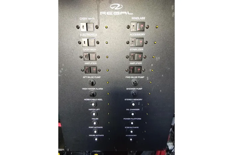 Me Yacht Photos Pics Control panel of a 2021 Regal 42 Fly yacht with various switches and indicators.