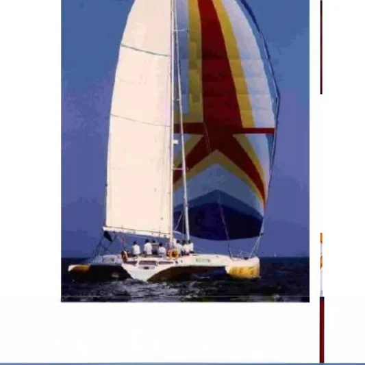 Koa E Kea Yacht Photos Pics Sailing yacht "Pinta Exception 53" from 1986 with colorful sails on open water.