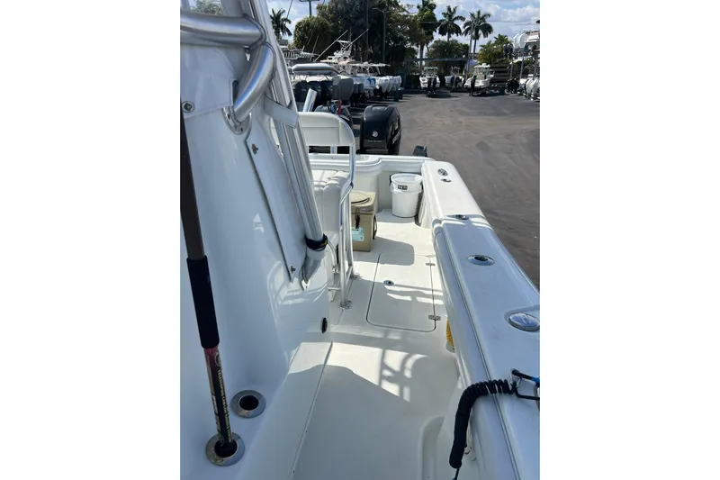  Yacht Photos Pics 2019 Yellowfin 29 Offshore boat deck with fishing rod holders and storage.