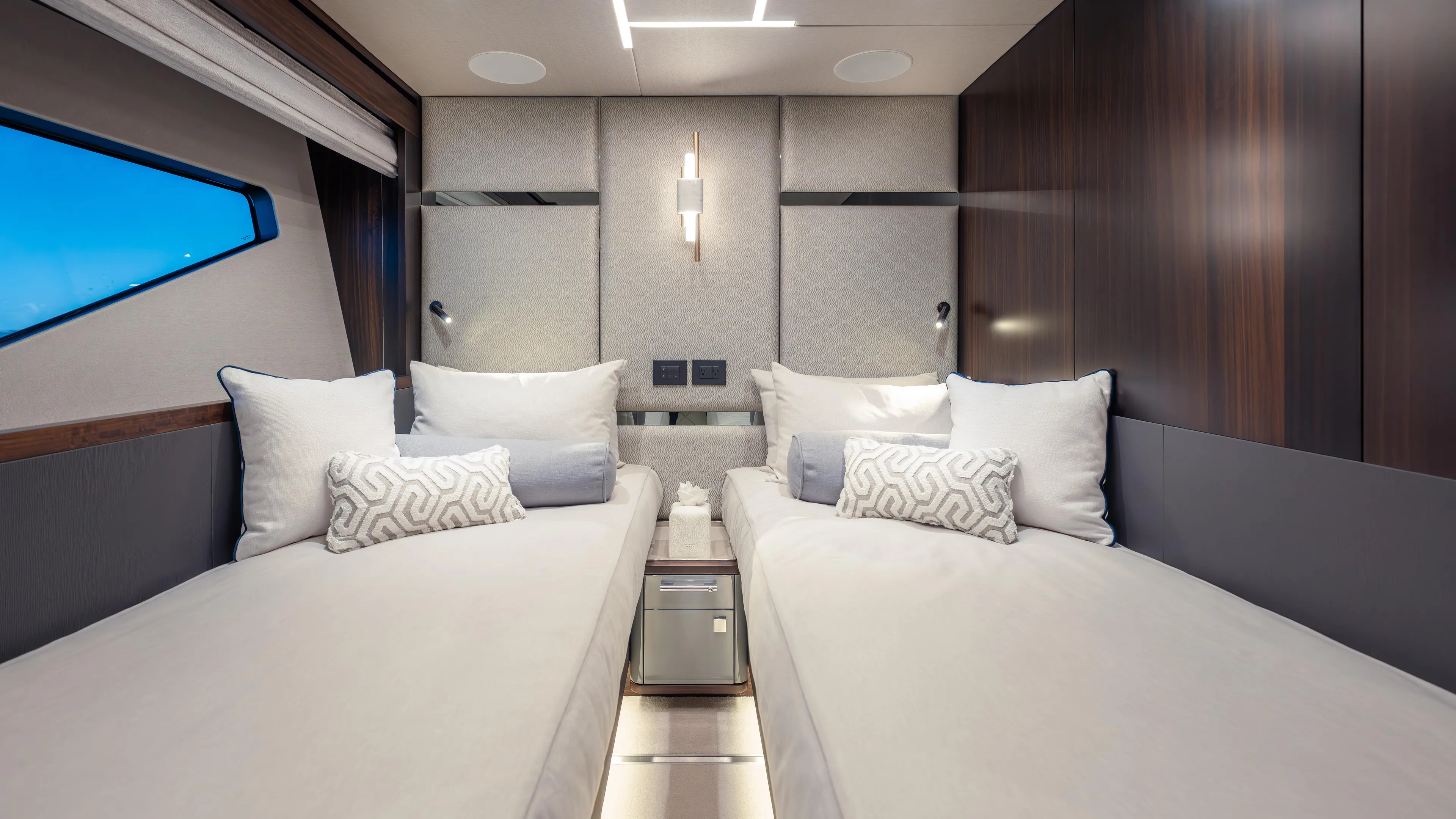 Hideout Yacht Photos Pics Luxurious twin cabin interior of 2025 Sunseeker 88 Yacht with modern design and plush bedding.
