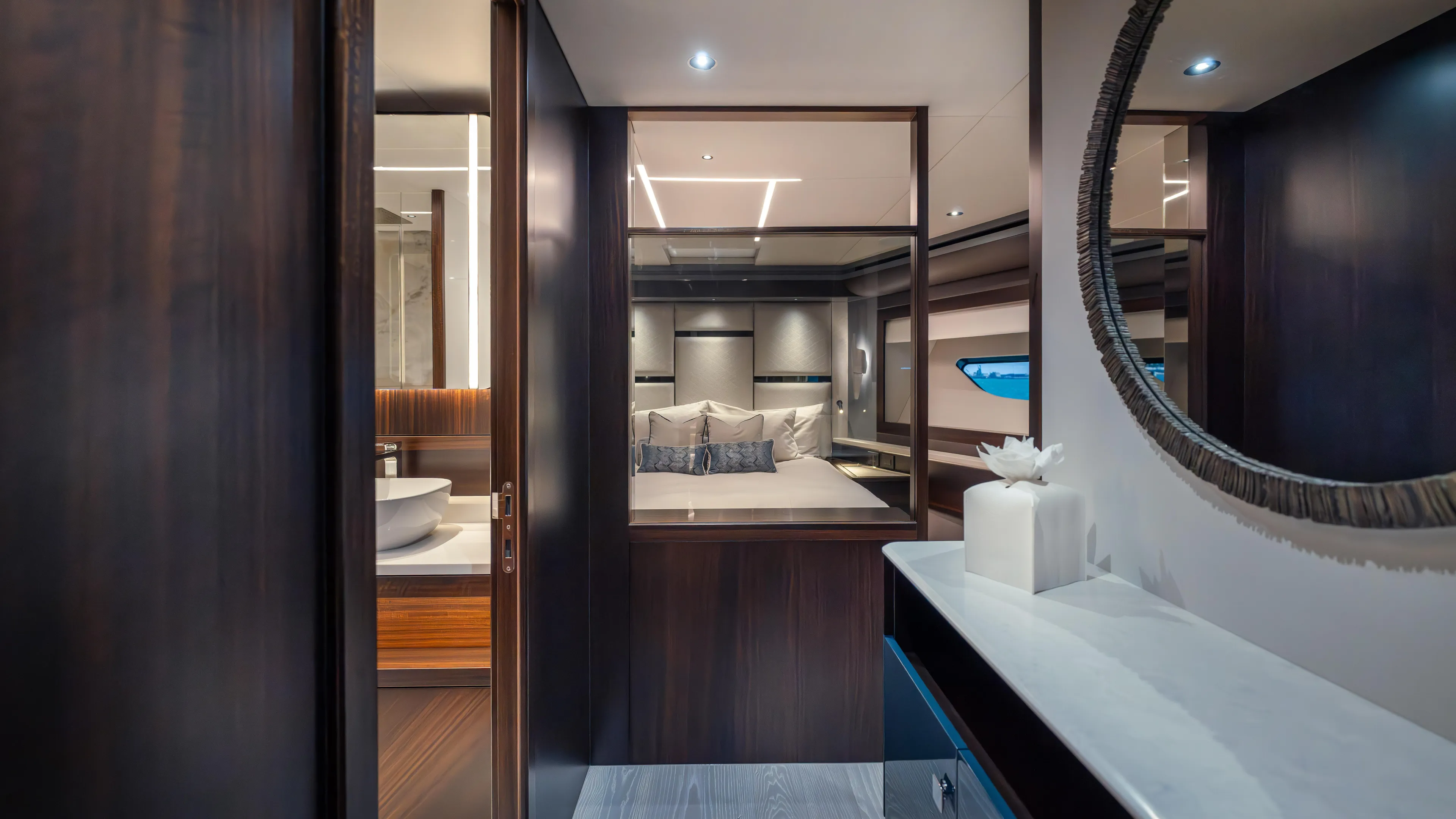 Hideout Yacht Photos Pics Luxurious interior of 2025 Sunseeker 88 Yacht, featuring elegant bedroom and bathroom design.