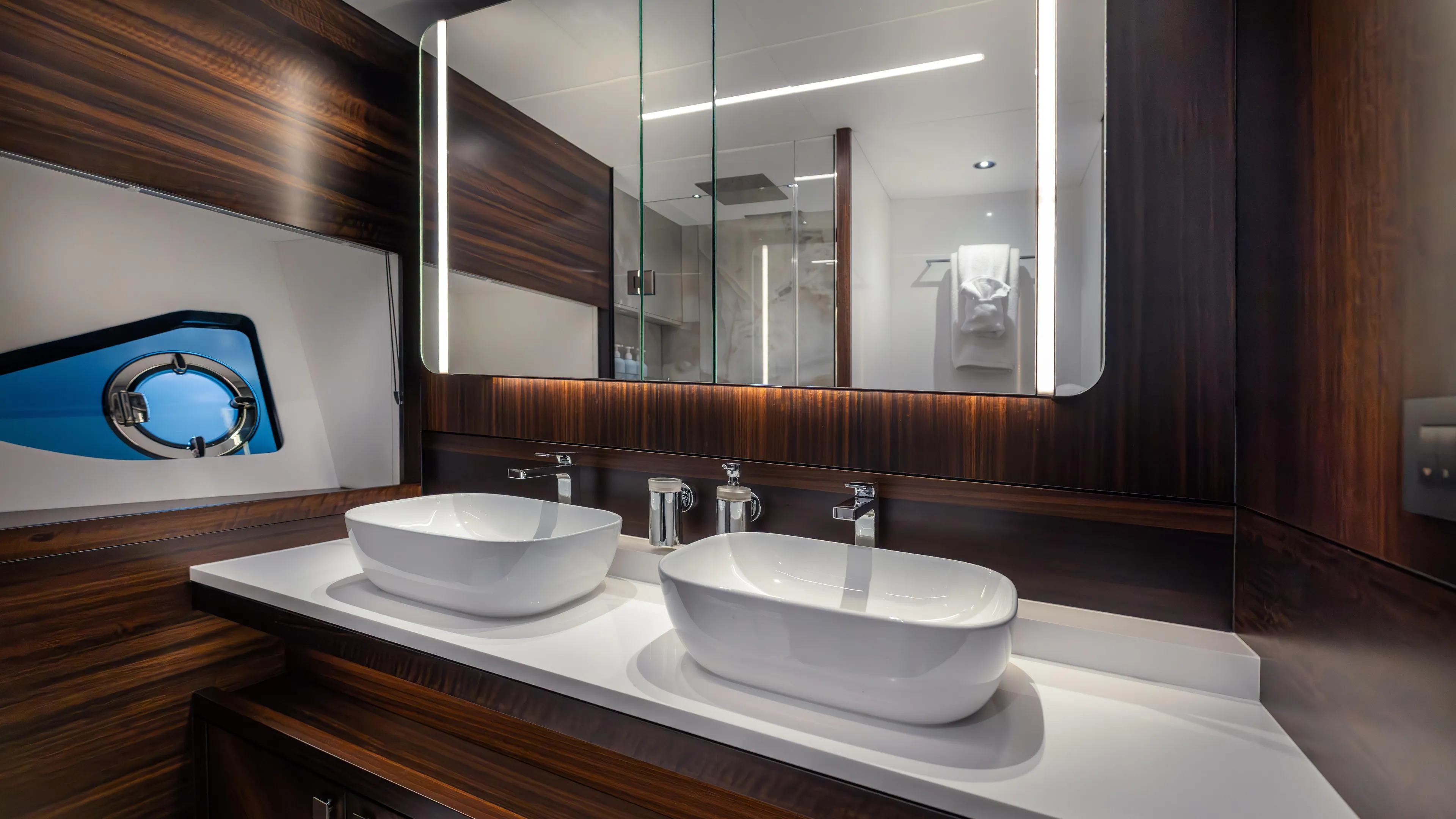 Hideout Yacht Photos Pics Luxurious bathroom in 2025 Sunseeker 88 Yacht with dual sinks and modern design.