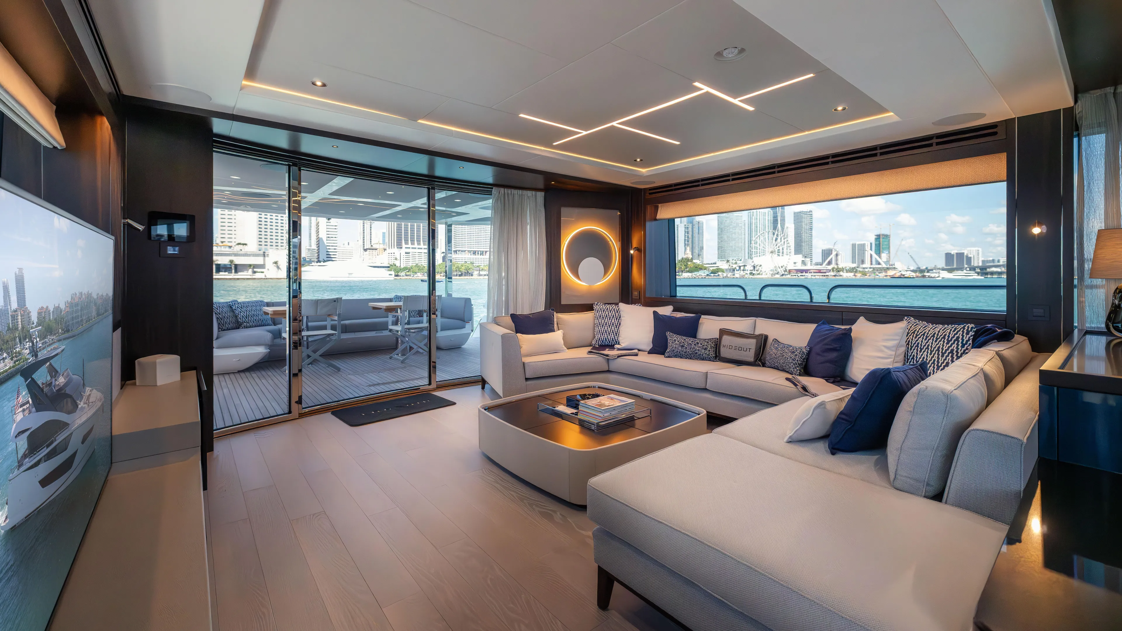 Hideout Yacht Photos Pics Luxurious interior of 2025 Sunseeker 88 Yacht with modern decor and waterfront view.