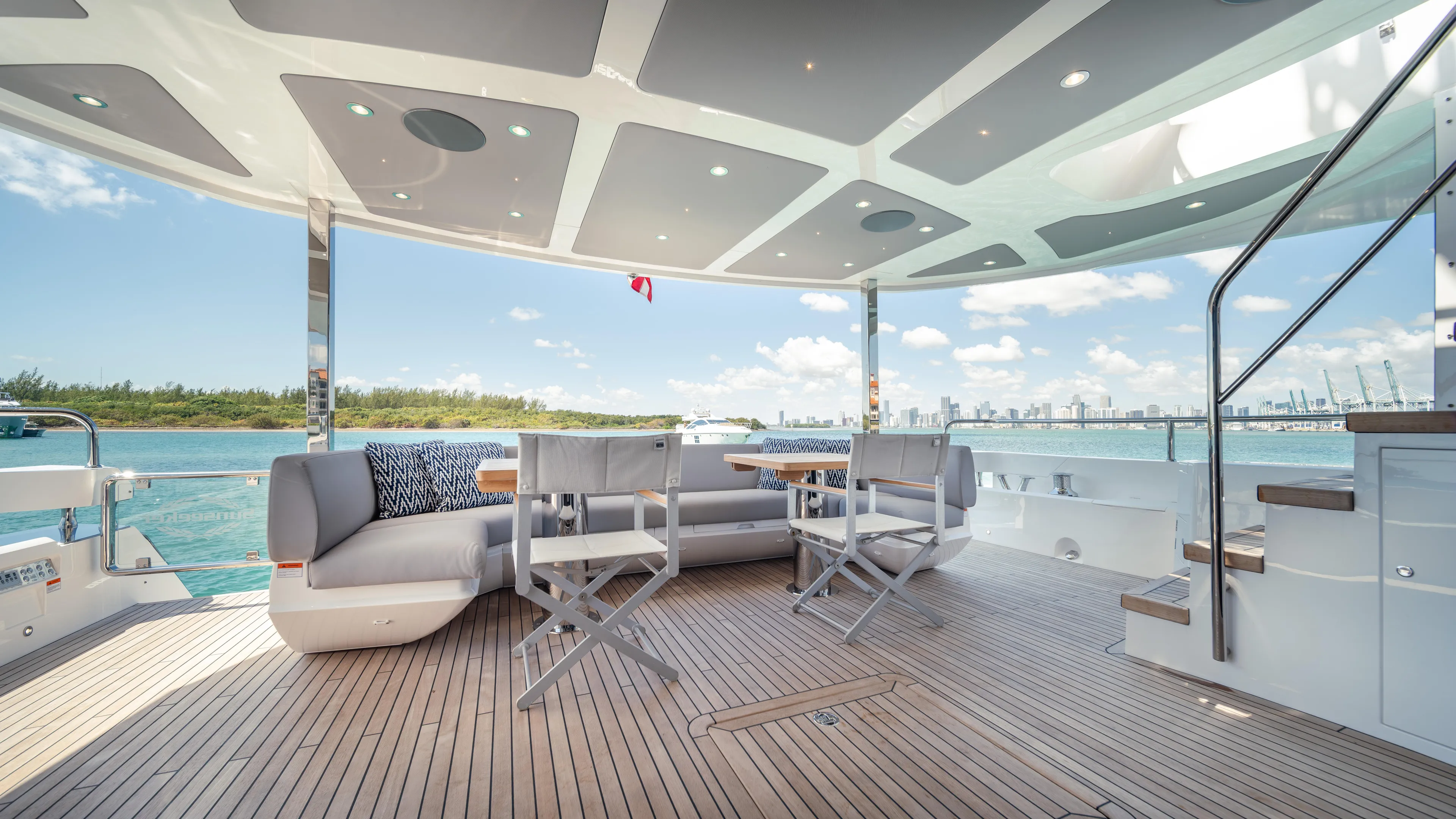 Hideout Yacht Photos Pics Luxurious Sunseeker 88 Yacht 2025 deck with seating, ocean view, and modern design.