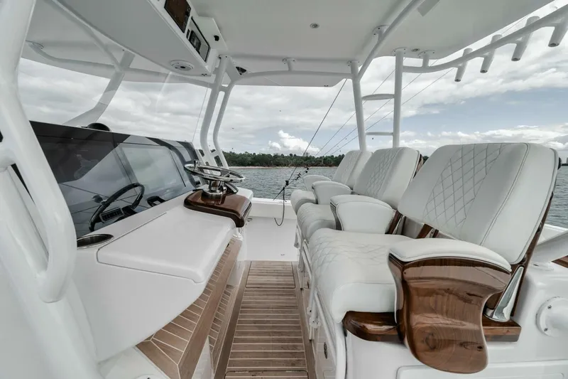  Yacht Photos Pics Luxurious interior of 2023 Jupiter 40 boat with plush seating and sleek design.