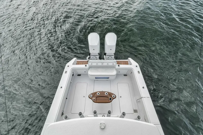  Yacht Photos Pics 2023 Jupiter 40 boat stern with dual engines on water.