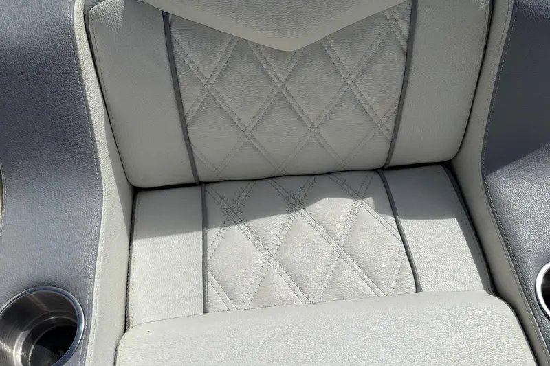  Yacht Photos Pics Luxurious quilted seat detail in a 2005 Marlago 35 boat interior.