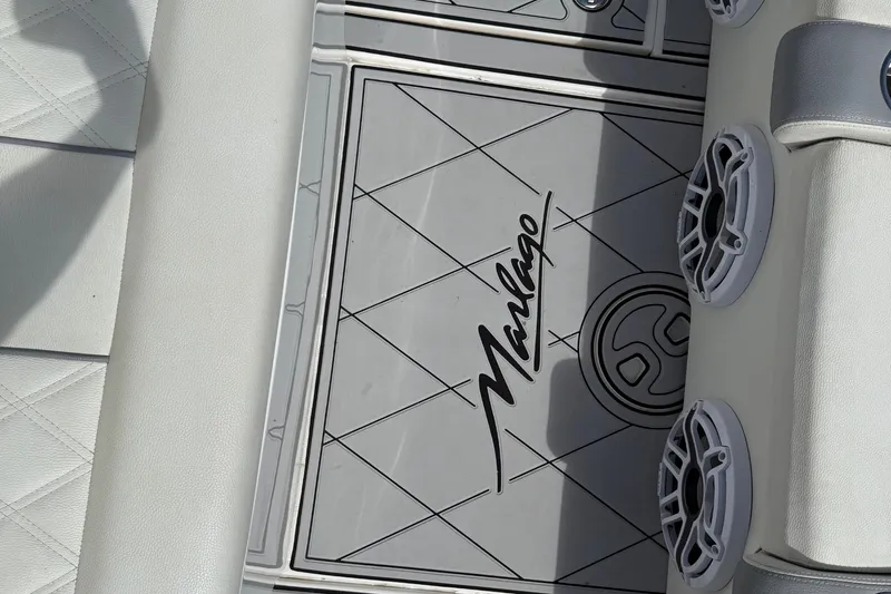  Yacht Photos Pics 2005 Marlago 35 boat interior with logo and speaker details.