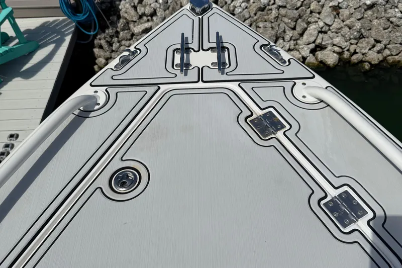  Yacht Photos Pics Bow of a 2005 Marlago 35 boat with sleek design and hardware details.