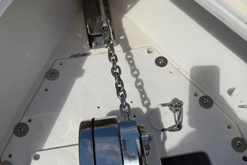  Yacht Photos Pics Anchor chain mechanism on a 2005 Marlago 35 boat deck.